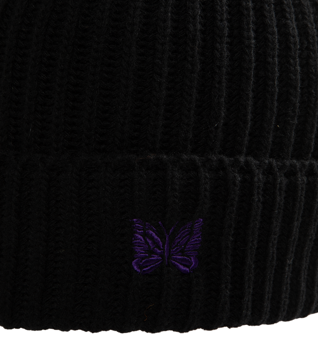 Image 3 of 3 - BLACK - Needles Watch Cap is crafted from Shetland wool and features a classic watch cap silhouette with the brand's signature embroidered Papillon motif at the front. Designed for warmth and everyday wear, the soft yet durable knit benefits from the natural insulating properties of Shetland wool, which helps retain heat while remaining comfortable. Main Material: 100% Wool. Made in Japan.
