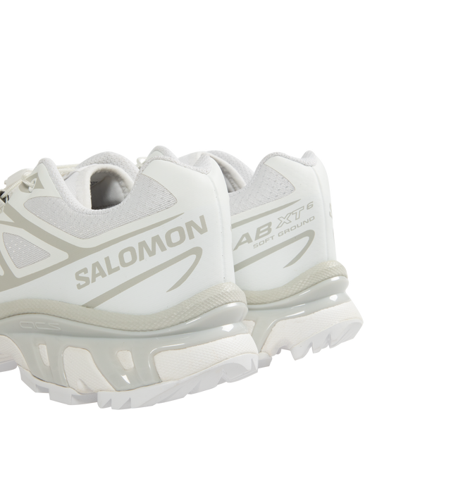 Image 3 of 5 - WHITE - Salomon XT-6 Sportstyle Sneakers are a lace-up style with an Agile Chassis System, abrasion-resistant TPU materials, single-layer mesh, SensiFit systems, protective toecaps, lace pockets for the Quicklace lacing system, molded OrthoLite sock liners, and rubber outsoles.