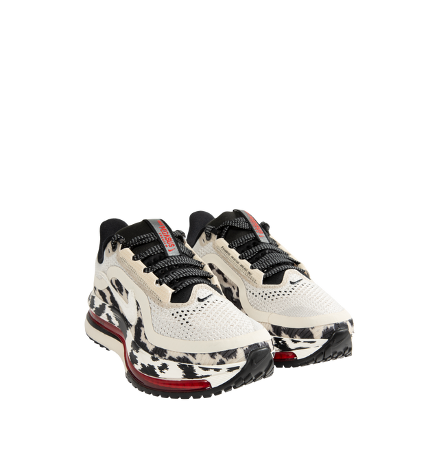 Image 2 of 5 - MULTI - Nike Women's Pegasus Premium Road Running Shoes feature a circular knit upper engineered for lightweight breathability and a foam interior cushion for comfort. Upper: Knit Textile. Outsole: Rubber. Heel-to-Toe Drop: 10 mm.