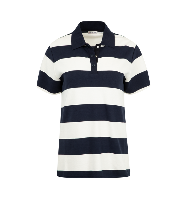 Image 1 of 3 - NAVY - MONCLER Striped Polo Shirt featuring woven viscose, collar, short sleeves and snap button closure. 90% viscose/rayon, 8% polyamide/nylon, 2% elastane/spandex.