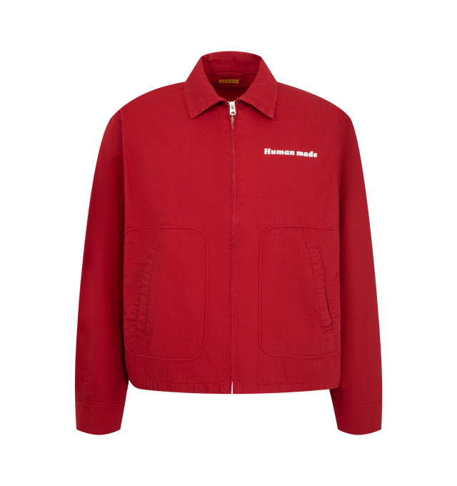 Image 1 of 3 - RED - Human Made Men's Work Jacket is crafted from thick, firm cotton twill and features a wide, boxy silhouette inspired by classic workwear. Designed with a front zip closure, the jacket is finished with a pig graphic patch on the back, a chain-stitched Human Made logo at the left chest, and signature heart buttons at the cuffs. Main Material: 100% Cotton. Lining: 100% Polyester. Decoration: 100% Cotton.