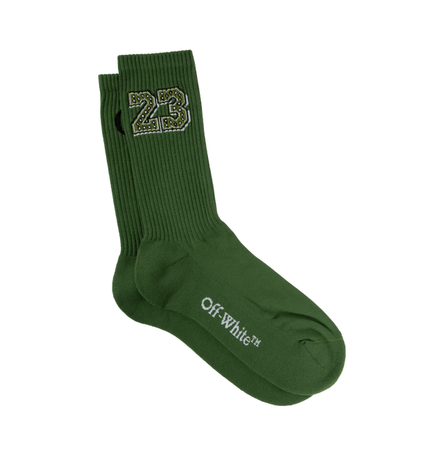 Image 1 of 2 - GREEN - OFF-WHITE 23 BANDANA SOCKS are green mid height that feature the number 23 in a bandana print on the calf with the Off White logo on the sole. 30% Polyamide 67% Cotton 3% Elastane 