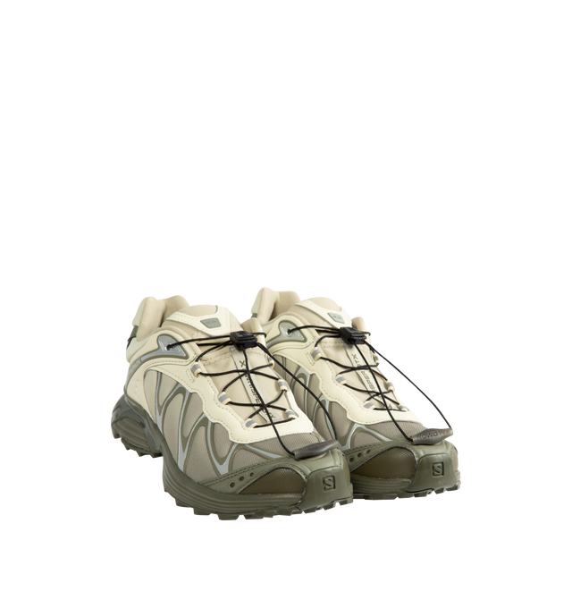 Image 2 of 5 - GREEN - Salomon Unisex XT-Whisper GORE-TEX Sneakers reimagine a trail-inspired icon with a modern performance-driven design. Crafted with a waterproof and breathable GORE-TEX membrane, this versatile style is engineered for all-weather wear while maintaining lightweight comfort and protection.Main Material: Synthetic and Textile Upper. Membrane: GORE-TEX Waterproof Protection. Closure: Quicklace System. Outsole: Contagrip Rubber.*Unisex style in men's sizing.