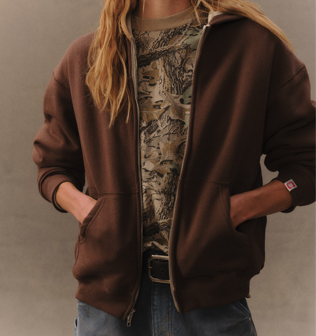 Image 4 of 6 - BROWN - Cherry LA Men's 5 Star Thermal Zip Hoodie is crafted from custom cotton fleece and features a boxy-fit silhouette, a full-zip front closure, and a custom poly-cotton thermal lining for added warmth and comfort. Designed with embroidery at the back, a nickel zipper, and a branded label at the cuff, this elevated everyday layer combines utility-inspired details with Cherry LA's signature aesthetic. Main Material: Custom Cotton Fleece. Lining: Custom Poly-Cotton Thermal. Made in Los Ange