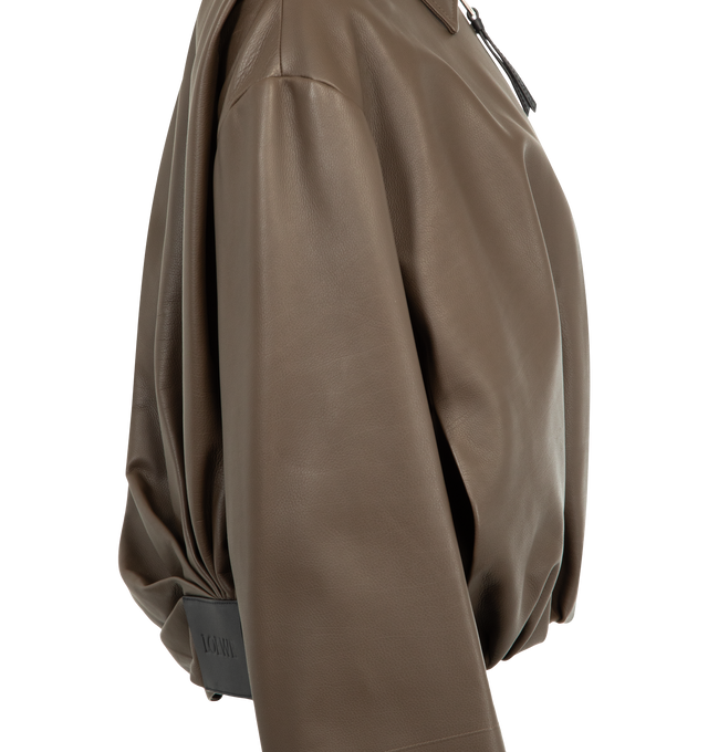 Image 3 of 3 - GREEN - Loewe Jacket in medium-weight nappa calfskin featuring a balloon silhouette with asymmetric hand-gathered draping at the back. Regular fit, short length, classic collar, zip front fastening, seam pockets, fully lined with LOEWE embossed leather patch placed at the back. Made in Italy.