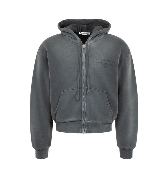 Image 1 of 2 - GREY - Acne Studios Hooded Sweatshirt featuring sprayed cotton fleece, regular unisex fit, waist-length, long sleeves, zip-up front, drawcord hood, ribbed cuffs and hem, kangaroo pockets and Acne Studios 1996 logo stamp on chest. 100% cotton.