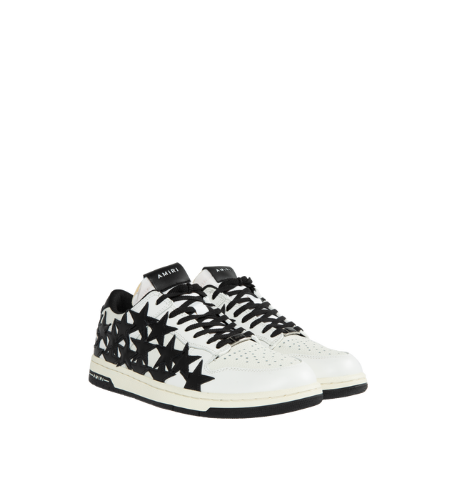 Image 2 of 5 - BLACK - AMIRI Stars Leather Low-Top Sneakers featuring flat heel, round toe, logo on the tongue and heel, lace-up vamp, star clusters on the side and rubber outsole. 