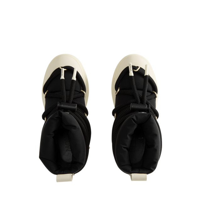 Image 4 of 4 - BLACK - Moncler Women's Altive Mid Snow Boots are designed with a boudin-quilted nylon upper and textured rubber overlays for lightweight protection and cold-weather performance. This mid-height silhouette features a wraparound drawstring fastening, pull tab at the backstay, and a round toe for comfortable everyday wear. Engineered with an EVA midsole and a Vibram MEGAGRIP tread for enhanced traction and durability, the style is finished with a lightweight TPU outsole for dependable grip in w