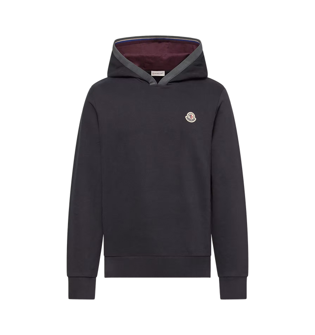 Image 1 of 1 - BLUE - Moncler Mens Brushed Cotton Logo Hoodie is crafted from cotton fleece. Features a regular fit, adjustable hood, and logo patch. Base Fabric: 100% Cotton; Hood: 100% Cotton; Hood Lining: 100% Cotton; Hem Rib: 95% Cotton, 5% Elastane/Spandex; Cuffs Rib: 95% Cotton, 5% Elastane/Spandex. Made in Turkey.