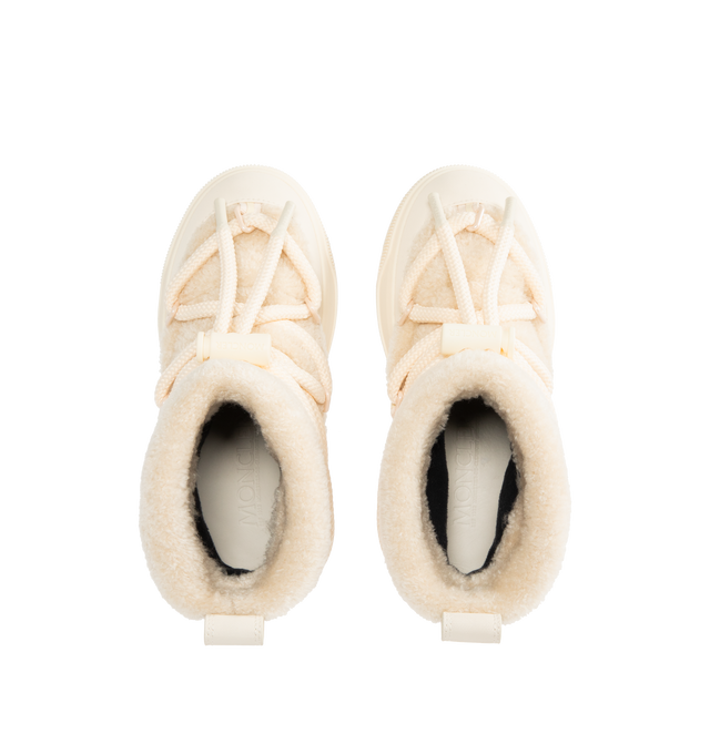 Image 4 of 4 - WHITE - MONCLER Altive Mid Snow Boots featuring nylon and textured rubber upper, mesh insole, drawstring fastening, TPU sole and Vibram Megagrip rubber tread. 16 cm calf length. Sole height 4.2 cm. 87% polyamide/nylon, 13% elastane/spandex; Lining: 100% polyamide/nylon. Sole: 100% elastodiene.