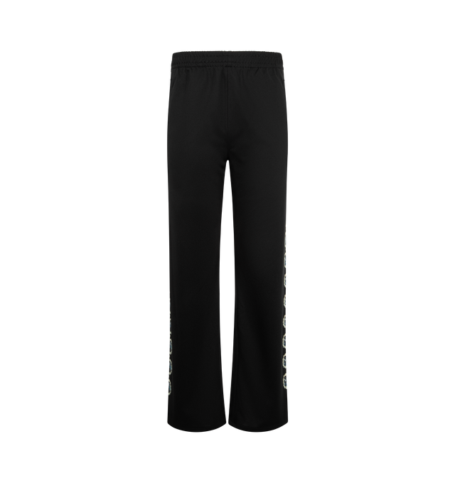 Image 1 of 4 - BLACK - PLEASURES x Richard Bernstein Mythic Hope Track Pants featuring giant jewels cascade down the legs, relaxed fit, elastic waist with internal drawcord, side-seam pockets and back patch pocket. 100% polyester.