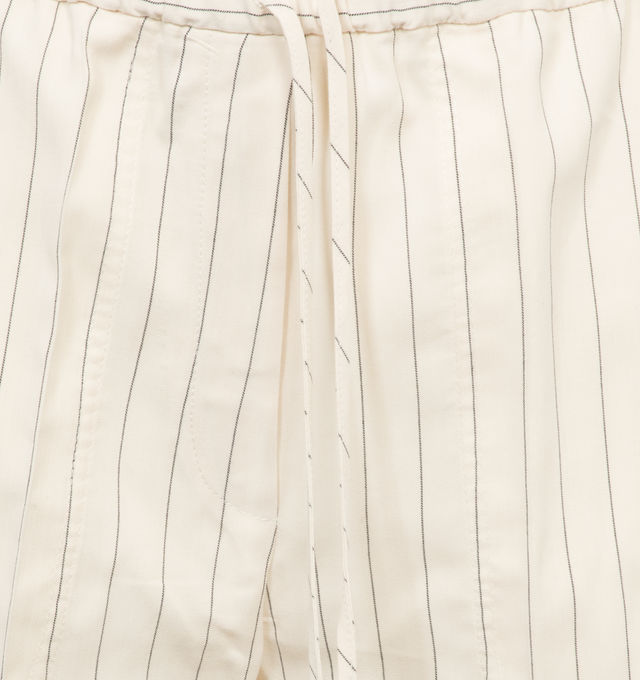 Image 4 of 4 - WHITE - TOTEME Relaxed Pinstripe Shorts featuring relaxed and fluid silhouette suspended from an elasticated drawstring waist and are fitted with side and back pockets. 76% viscose, 24% lyocell. 