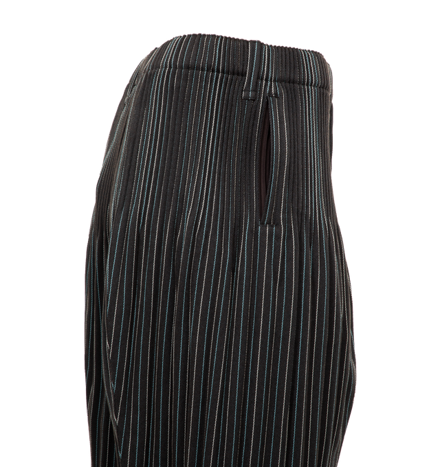 Image 3 of 4 - BROWN - ISSEY MIYAKE TWEED PLEATS PANTS featuring a slim, tapered leg, full-length hem, center seam detail, elastic waistband and two pockets. 100% polyester. 