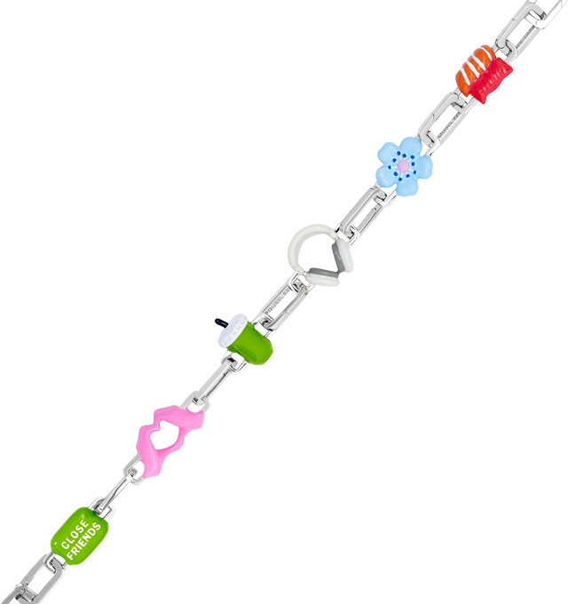 Image 2 of 9 - MULTI - Poubel by The Gstaad Guy Colton completed bracelet set. An ode to the hypebeast homies, matcha wifeys, and everything in between, The Colton Completed Set includes: 1x Close Friends Charm, 1x Heart Hands Charm, 1x Iced Matcha Charm, 1x Headphones Charm, 1x Fleur Bleue Charm (also known as The Blue Flower), 1x Sushi Charm, 9x interchangeable sterling silver links. Poubel links are made with recycled, rhodium plated, sterling silver, comprised of 92.5% pure silver and 7.5% other metal