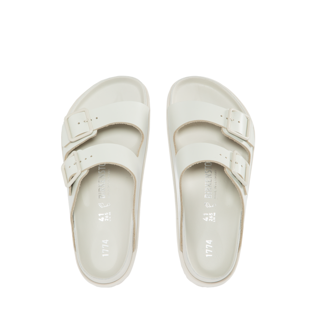 Image 4 of 4 - WHITE - BIRKENSTOCK 1774 III ARIZONA featuring 1774 branding in the heel cup, premium semi-shiny smooth leather, anatomically shaped BIRKENSTOCK cork-latex footbed, covered with premium nappa leather and soft EVA outsole ensuring comfort and flexibility.  