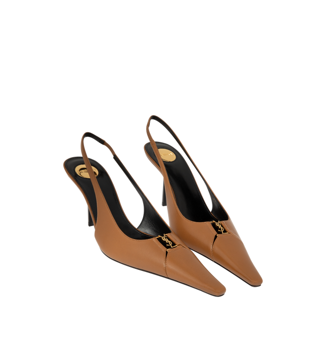 Image 2 of 4 - BROWN - Saint Laurent Womens Slingback Pumps are crafted from lambskin leather. Feature a cut-out elongated toe with signature Cassandre hardware, elasticized slingback strap, low stiletto heel, leather sole, and engraved Saint Laurent insole plaque. Main Material: Lambskin Leather; Hardware: Brass; Sole: Leather. Heel Height: 7.5 CM / 3 Inches Made in Italy.