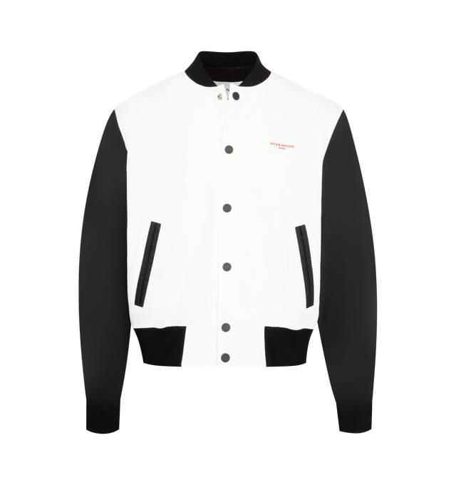 Image 1 of 3 - WHITE - GIVENCHY Bi-Material Blouson with Photographic Negative Print featuring cotton twill with contrasting nylon sleeves, bomber collar, contrasting Givenchy Paris signature embroidered on the chest, photographic Negative print on the back, snap button closure, two side pockets with contrasting piping, elasticated knitted collar, hem and cuffs and lightweight fabric. 100% cotton. 100% polyamide. Filling: 90% viscose, 10% wool. Lining: 100% cupro. Made in Italy.