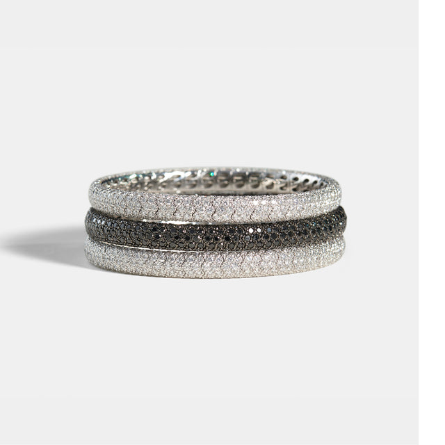 Image 3 of 3 - BLACK - SIDNEY GARBER Pave Stretch: 18k White Gold with Black Rhodium and Black Diamonds Narrow Pave Stretch Bracelet, 7.85ct, 16.5cm. This classic bracelet is paved with diamonds in a smooth, perfect circle. It also has a little trick up its sleeve: We made it to be entirely flexible so it slips on without a clasp. Diamonds 7.85 Carats, 18k White Gold with Black Rhodium. Approximately 0.25 Inch Wide.