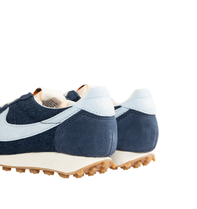 Image 3 of 5 - NAVY - NIKE LD-1000 Sneaker featuring dramatically flared heel, upper combines leather and textiles, waffle outsole, foam midsole and rubber outsole.