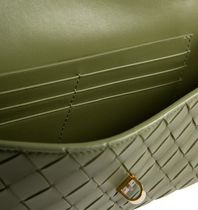 Image 3 of 3 - GREEN - BOTTEGA VENETA Andiamo Clutch featuring top handle, intrecciato leather with signature metallic knot closure, six card slots and one additional pocket. 5.1" x 12.2" x 1.2. Lambskin, calfskin. Made in Italy.