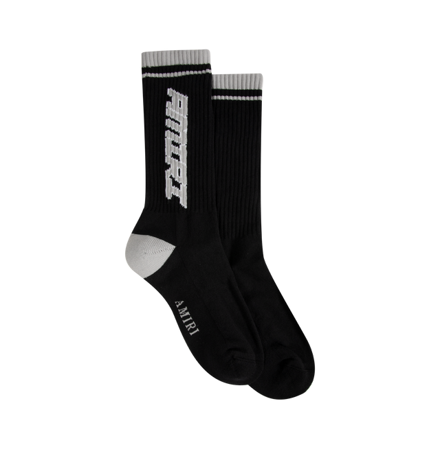 Image 1 of 2 - BLACK - Amiri Men's Logo Socks featuring calf-high knit stretch cotton-blend socks, stripes and logo at rib-knit cuffs and at sole. 78% cotton, 20% polyester, 2% spandex. Made in China.