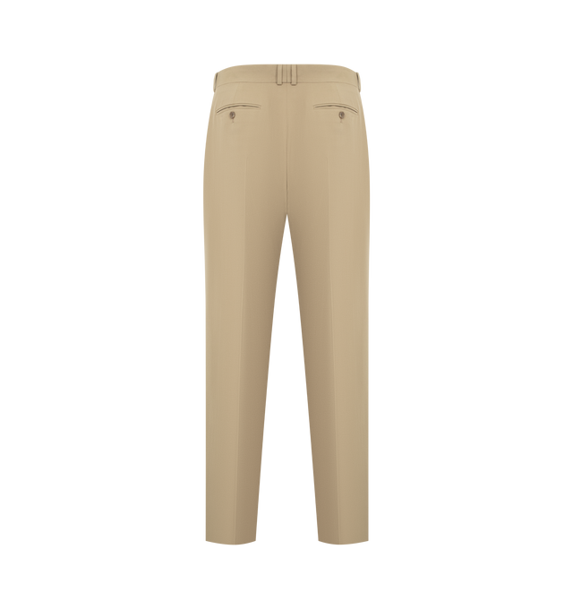 Image 2 of 3 - NEUTRAL - THE ROW Thom Pant featuring mid-rise tailored trouser in Japanese worsted wool with straight leg, pressed front pleats and side welt pockets. 100% wool. Made in Italy.