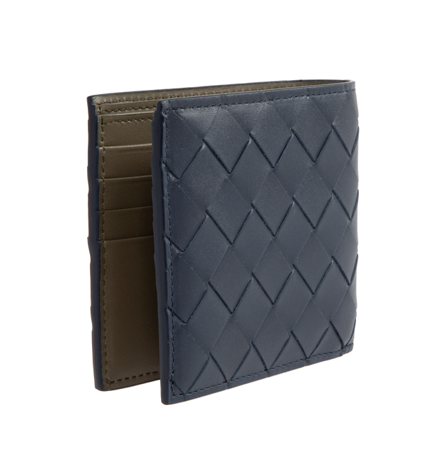 Image 2 of 3 - NAVY - BOTTEGA VENETA Intrecciato Bi-Fold Wallet featuring intrecciato calfskin leather wallet with contrasted interior, eight card slots, two bill compartments, two additional pockets. 3.7 x 4.3 x 0.4. Calfskin. Made in Italy.