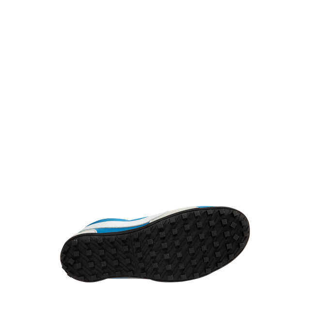 Image 4 of 5 - BLUE - Nike Men's Moon Shoe OG SP Sneakers feature an Italy Blue and Neutral Grey nylon upper with black and white accents and a leather Swoosh. Inspired by Nike's original 1970s running shoe, the streamlined silhouette is finished with a rubber Waffle outsole for durable traction. Upper: Nylon and Leather. Sole: Rubber.