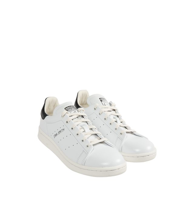 Image 2 of 5 - WHITE - ADIDAS Originals Stan Smith Lux Shoes with a clean and genderless look that nods to the OG, elevated with premium details. The court-inspired shoe is crafted entirely from buttery-soft leather with leather inner lining and an extra leather patch in the heel that provides heightened comfort and durability. Featuring foil branding on the tongue, lace closure, and 360-degree stitching around tooling. Unisex style in men's sizes.