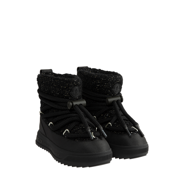 Image 2 of 4 - BLACK - Moncler Women's Altive Mid Snow Boots are crafted from a wool-blend boucl upper woven with subtle metallic gold threads and feature a mid-height snow boot silhouette, a round toe, and a wraparound drawstring closure. Designed for cold-weather performance, this style is equipped with an EVA midsole, a Vibram Megagrip outsole for enhanced traction and durability, and an OrthoLite insole for lasting comfort. A pull tab at the back and nylon lining complete the functional design. Main Mat