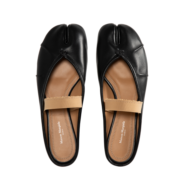Image 4 of 4 - BLACK - MAISON MARGIELA Tabi Leather Ballerina Mules featuring slip-on style, low stacked heel, elasticated strap, raw edge, split toe, branded footbed and leather sole. 100% leather. Made in Italy.