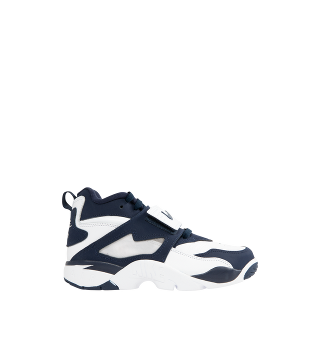 Image 1 of 5 - NAVY - NIKE Air Diamond Turf Sneaker featuring Air units in the heel and forefoot, durable leather, a midfoot strap for a secure fit, leather upper with mesh panels and rubber outsole.