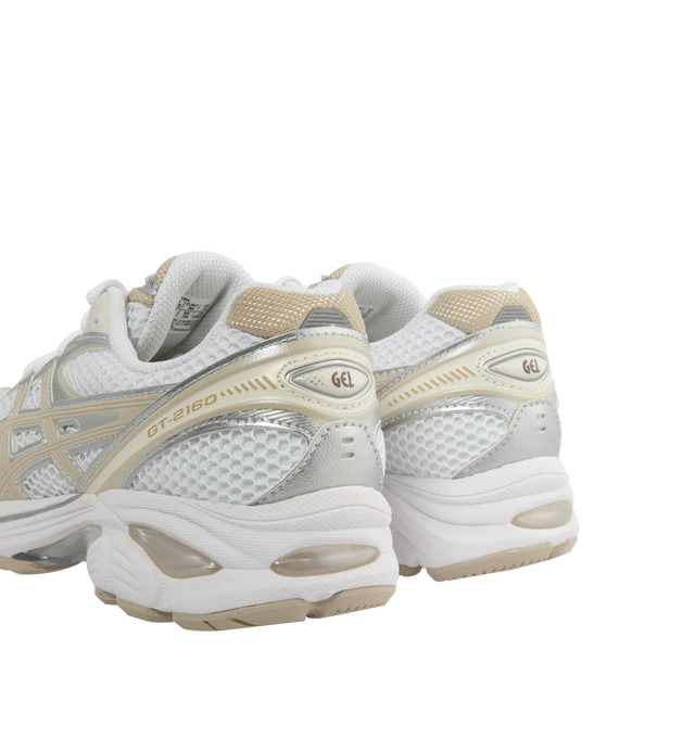 Image 3 of 5 - NEUTRAL - Asics GT-2160 sneaker with a sleek aesthetic and wavy forefoot sculpting, featuring a segmented midsole structure and GEL technology inserts for advanced cushioning. Unisex style in men's sizing.