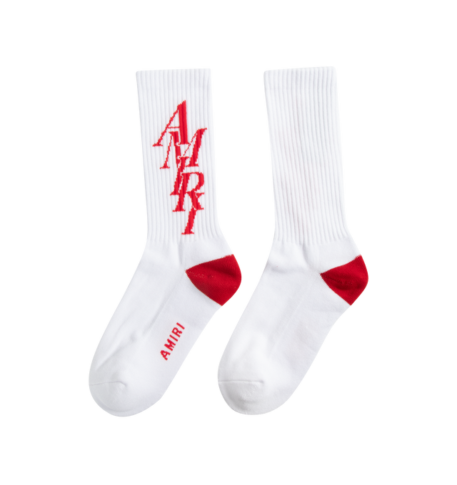 Image 2 of 2 - WHITE - AMIRI STACK SOCK are crew socks that feature an "Amiri Stack" logo motif on the calf, ribbed cuff to prevent slipping and reinforced toe and heel with a red contrasting color heel accent. 78% cotton, 20% polyester, 2% spandex. 