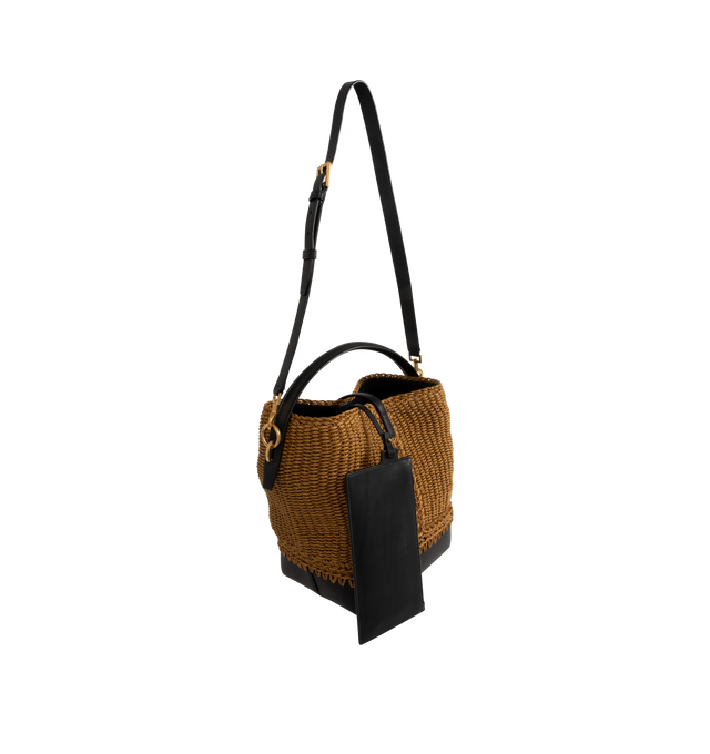 Image 2 of 3 - BROWN - SAINT LAURENT Le 37 Raffia Bucket bag made with rope and vegetable-tanned leather, featuring a cassandre hook closure, bronze-toned hardware, four metal feet, lined with certified linen, a removable zip pouch, top handle and adjustable and detachable strap. 7.9" x 9.8" x 6.3". Corde, calfskin, brass. Made in Italy.