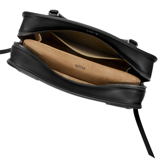 Image 13 of 17 - BLACK - Loewe Amazona Medium 180 Bag in soft calfskin leather featuring a relaxed silhouette with a single toron top handle, designed to be carried open, while a concealed closure secures the main compartment, removable shoulder and crossbody straps, zip closure with two leather zip pullers, two compartments, main compartment closed with magnetic closure, internal flat pocket, suede lining and embossed logo. Soft calfskin. Strap length 108 cm; Strap Drop 50 cm; Handle drop 11 - 28 cm; Heigh