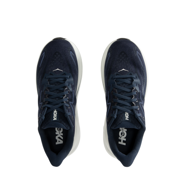 Image 5 of 5 - NAVY - HOKA Clifton 10 Sneaker featuring jacquard knit, reflective upper details, smooth MetaRocker, rearfoot-focused Active Foot Frame, CMEVA midsole, molded EVA sockliner and inherently durable abrasion rubber.
