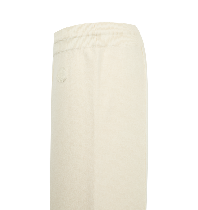Image 3 of 3 - CREAM - Moncler Women's Double Knit Wool & Cashmere Pants are crafted in a double-knit construction with a wool and cashmere blend exterior and a soft cotton interior. Designed with a fluid silhouette and loose fit, these knit pants feature an elasticated waistband with drawstring fastening and a leather logo patch. Main Material: 54% Virgin Wool, 35% Cotton, 7% Cashmere, 3% Polyamide, 1% Elastane. Leather Patch: Calf Leather. Made in Bulgaria.