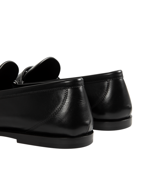 Image 3 of 4 - BLACK - SAINT LAURENT Ryan 05 Penny Loafers in leather featuring stacked heel, round moc toe, penny keeper strap with Cassandre hardware, leather outsole and slip-on style. Made in Italy.
