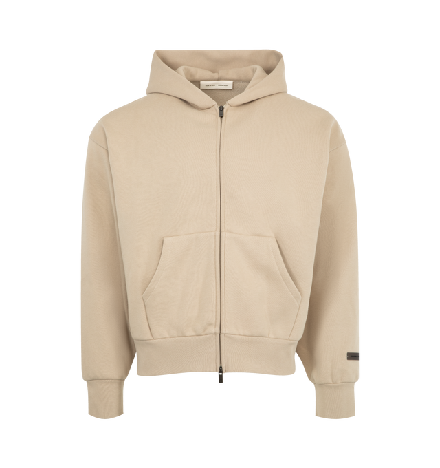 Image 1 of 2 - BROWN - FEAR OF GOD ESSENTIALS Classic Fleece Zip-Up Hoodie featuring 380gsm core fleece, zip-up closure, classic fit with signature Fear of God relaxed proportions, new beveled metallic "Essentials Fear of God" logo is branded across the back, double-layer hoodie, rib-knit cuffs, waist-hem, a kangaroo pocket and a translucent rubberized label on the hood and sleeve. 80% cotton, 20% polyester fleece.
