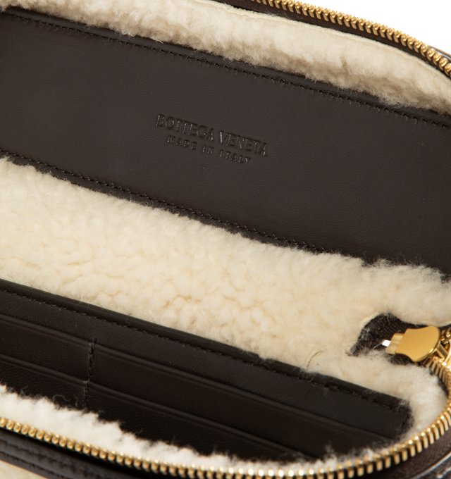 Image 3 of 3 - BROWN - BOTTEGA VENETA Bang Bang Bag featuring vanity case in aviator merino shearling with detachable strap, one main compartment, six card slots, zipper closure and unlined. 4.9" x 8.7" x 2". Sheepskin. Made in Italy.