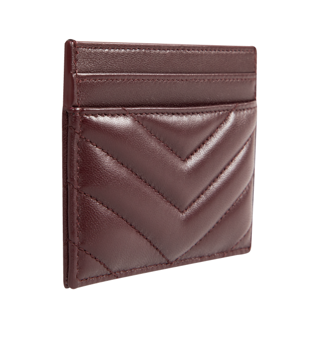 Image 2 of 3 - RED - SAINT LAURENT Monogram Card Case featuring five card slots, gold tone hardware, cassandre and chevron-quilted overstitching. 4 X 2.8 X 0.1 inches. 100% lambskin. Made in Italy.