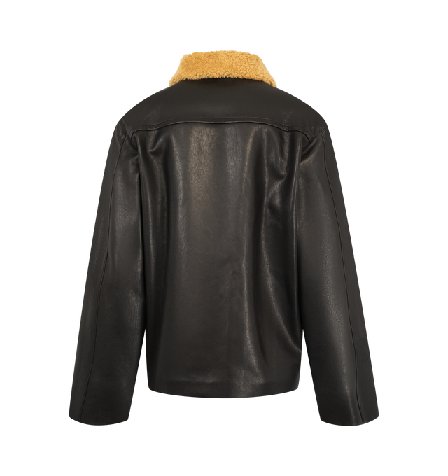 Image 2 of 3 - BLACK - Khaite Women's Wilson Caban Jacket is crafted from robust grained nappa lambskin and features a relaxed caban silhouette inspired by classic workwear. Designed with a curly lambskin shearling collar, button-front closure, graphic stitching, back yoke, quilted lining, duck down insulation, and oversized patch pockets for added functionality. Main Material: 100% Lambskin. Made in Italy.