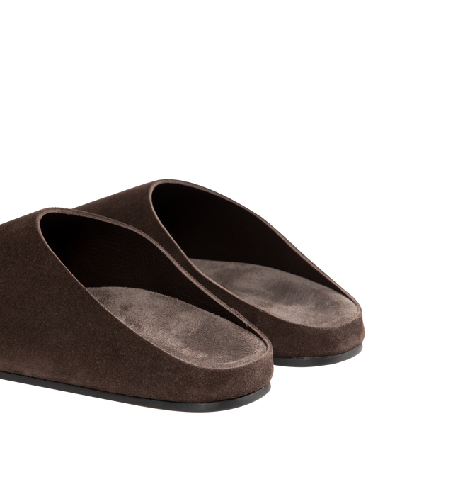 Image 3 of 4 - BROWN - THE ROW Hudson Slide in Suede featuring relaxed slip-on shoe in natural suede with round toe, contoured footbed, and rubber sole. 100% calfskin leather. Rubber sole. Made in Italy.