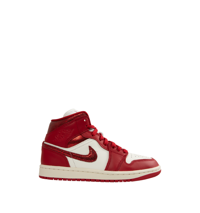 Image 1 of 5 - RED - JORDAN Air Jordan 1 Mid SE Sneaker featuring genuine leather in the upper, Nike Air technology, soft foam in the midsole, rubber in the outsole, wings logo on collar and Jumpman on tongue.