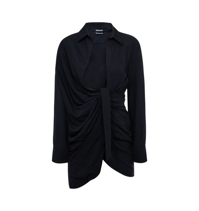 Image 1 of 2 - NAVY - JACQUEMUS Bahia Draped Knotted Twill Mini Dress featuring relaxed fit, pointed collar, plunging, draped neckline, hidden button under the sewn knot and square cuffs with mother-of-pearl buttons. 88% viscose, 12% polyamide/nylon. Made in Portugal. 