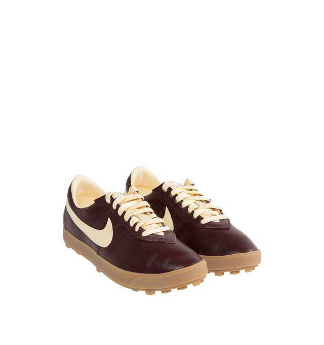 Image 2 of 5 - BROWN - NIKE Astrograbber Leather Sneaker featuring leather upper that softens and gains vintage character with wear, rubber waffle outsole, low-cut silhouette, padded collar and foam midsole.