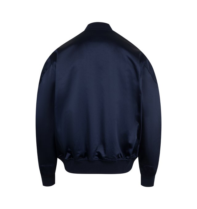Image 2 of 3 - NAVY - GIVENCHY Paris Zipped Blouson in satin featuring bomber collar, GIVENCHY Paris gros grain patch with zigzag stitchings embroidered on the front, zipped closure, two zipped pockets, ribbed collar, hem and and cuffs and relaxed fit. 53% cotton, 47% acetate. Lining: 100% cotton.