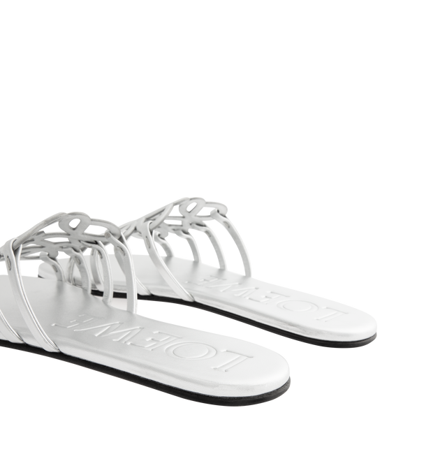 Image 3 of 4 - SILVER - LOEWE Petal Anagram Slide in laminated lambskin featuring a cut-out Anagram upper with hand-painted edges and hand-stitched seams, 5mm heel, embossed LOEWE on the insole, padded leather insole, rubber-injected island on the outsole and hand-stitched seams. Laminated lambskin. Made in Italy.