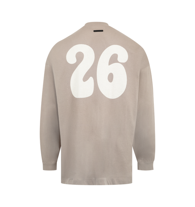 Image 2 of 2 - NEUTRAL - Fear of God Essentials Mens Sport Mesh Merch Long Sleeve Tee is crafted from cotton sport mesh. Features a boxy relaxed fit, ribbed crew neckline, dropped shoulders, ribbed cuffs, enzyme-washed finish, crackle-printed All Valley Essentials graphic at the front, crackle-printed "26" graphic at the back, and an Essentials signature label at the back collar. Main Material: 100% Cotton Sport Mesh.